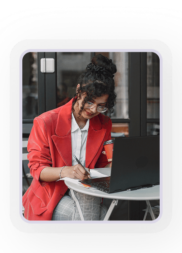Woman enjoying coffee while using phone