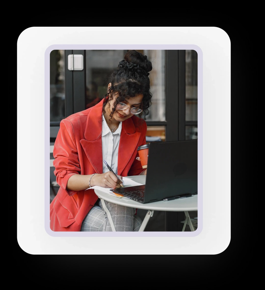Woman enjoying coffee while using phone